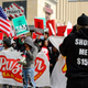 Protesters rally in St. Louis on Feb. 13, 2017, against President Donald Trump’s secretary of labor nominee Andrew Puzder outside a Hardee’s restaurant. (Jeff Curry/Getty Images)